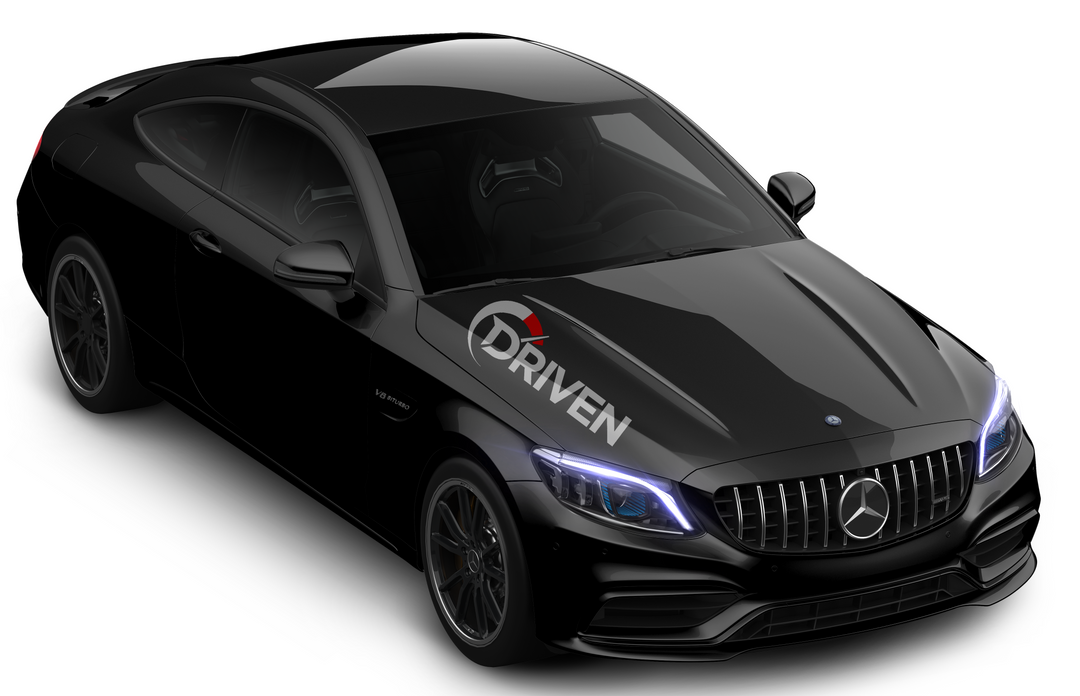 Black coupe with Xpel paint protection film, showcasing vehicle protection by Driven.