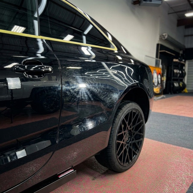 Before paint correction showing swirl marks and scratches