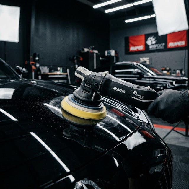 Professional machine polishing during paint correction at DrivenMN